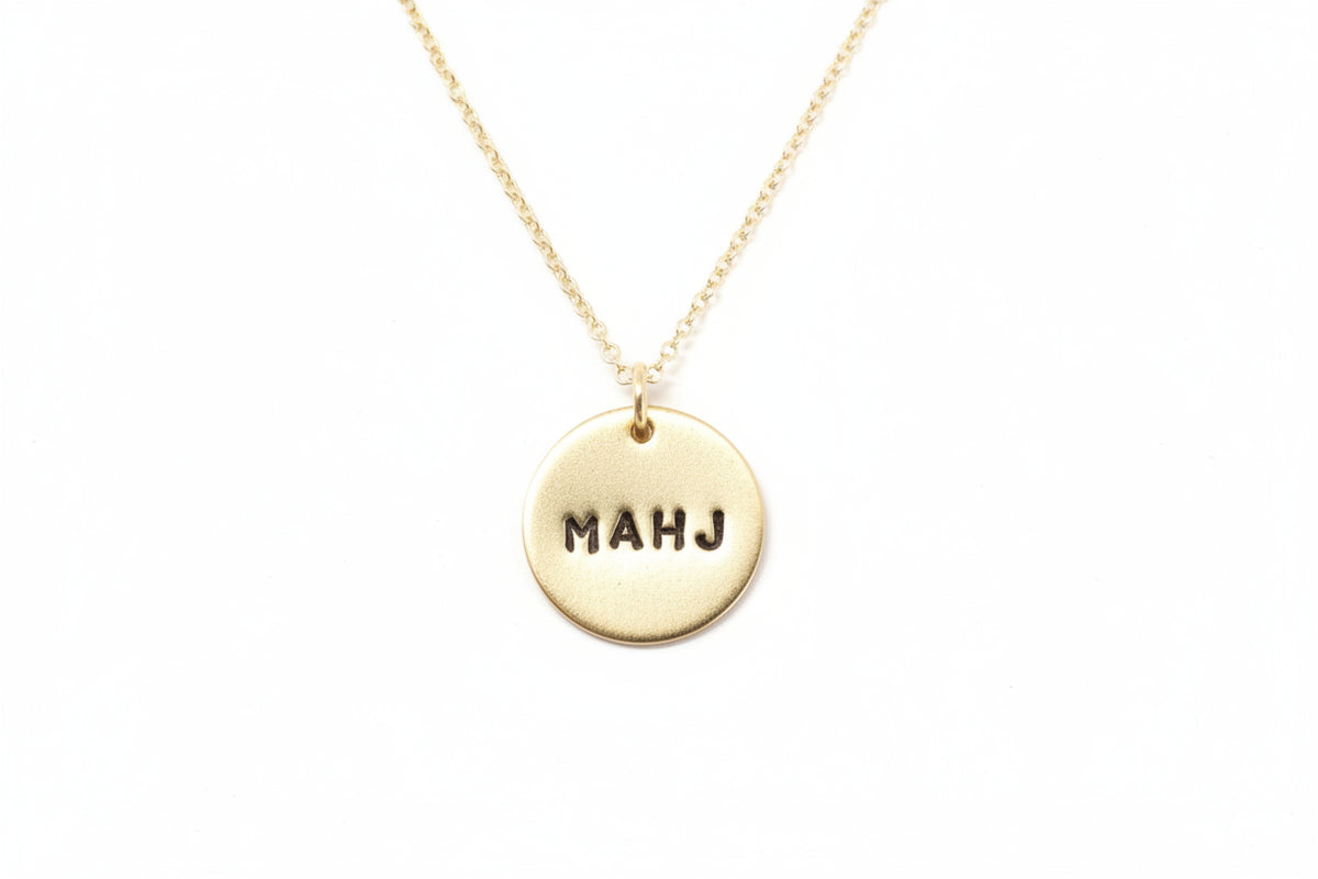 MAHJ hand-stamped pendant